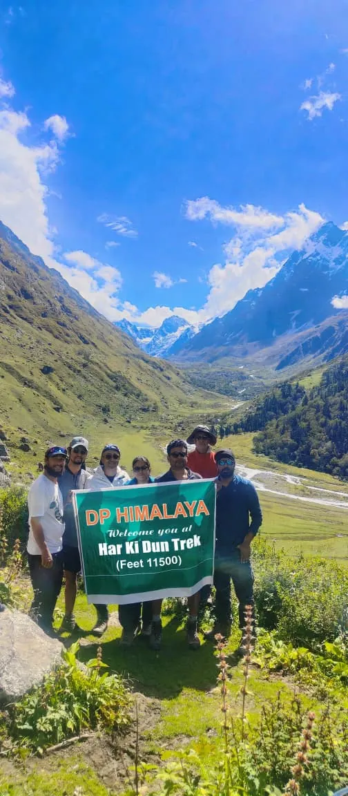 A small group at a scenic Himalayan viewpoint
